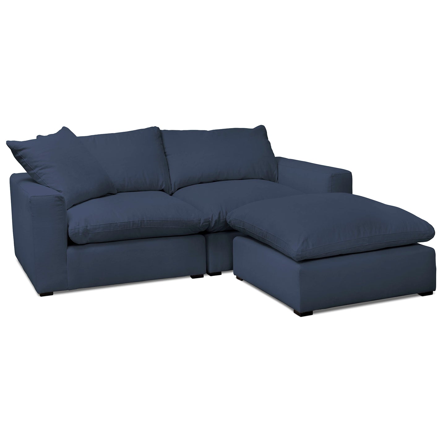 Blå stor, djup och skön soffa med fotpall